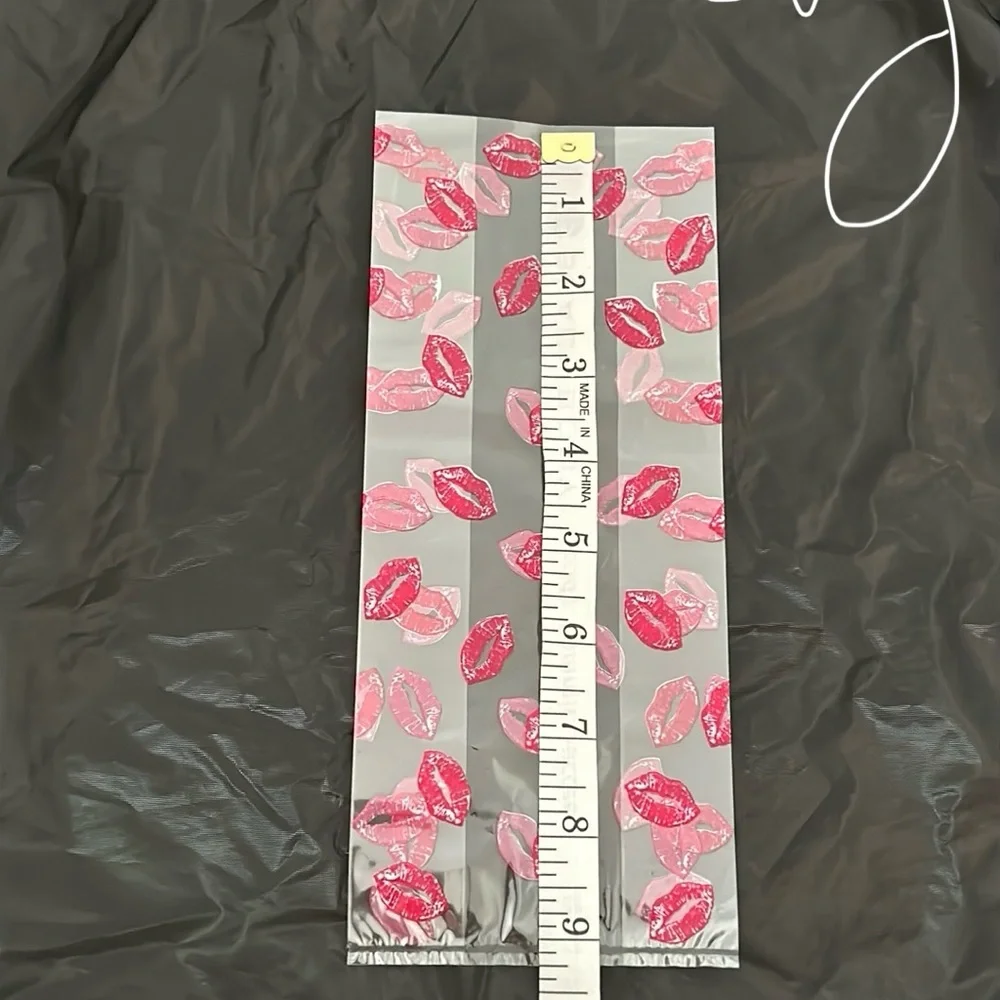NWT, cellophane lip bags & 2 lip cellophane rolls
